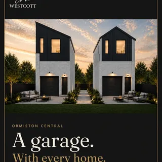Westcott Developments post: Carousel cover, A garage. With every home.: two standalone homes at dusk